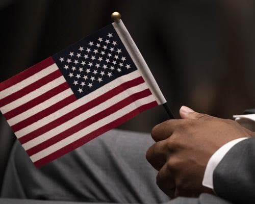 Thumbnail for I’m a refugee who reports on America’s ills. I still believe in its promise | Lok Darjee